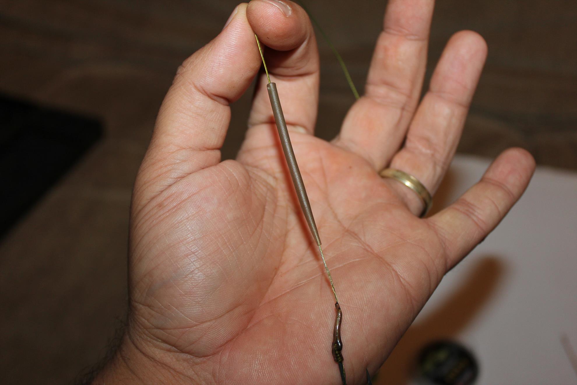 O montura de vara.. - Se trage sleevul pe montura